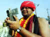 kumbh-sadhu_with_video_camera_AFP.jpg (29463 bytes)