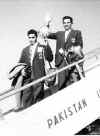 Squash-mo_and_roshan_bringing_british_open_trophy_to_DC.jpg (11733 bytes)